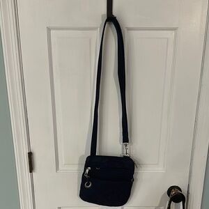 TravelonNavy Quilted Crossbody Bag